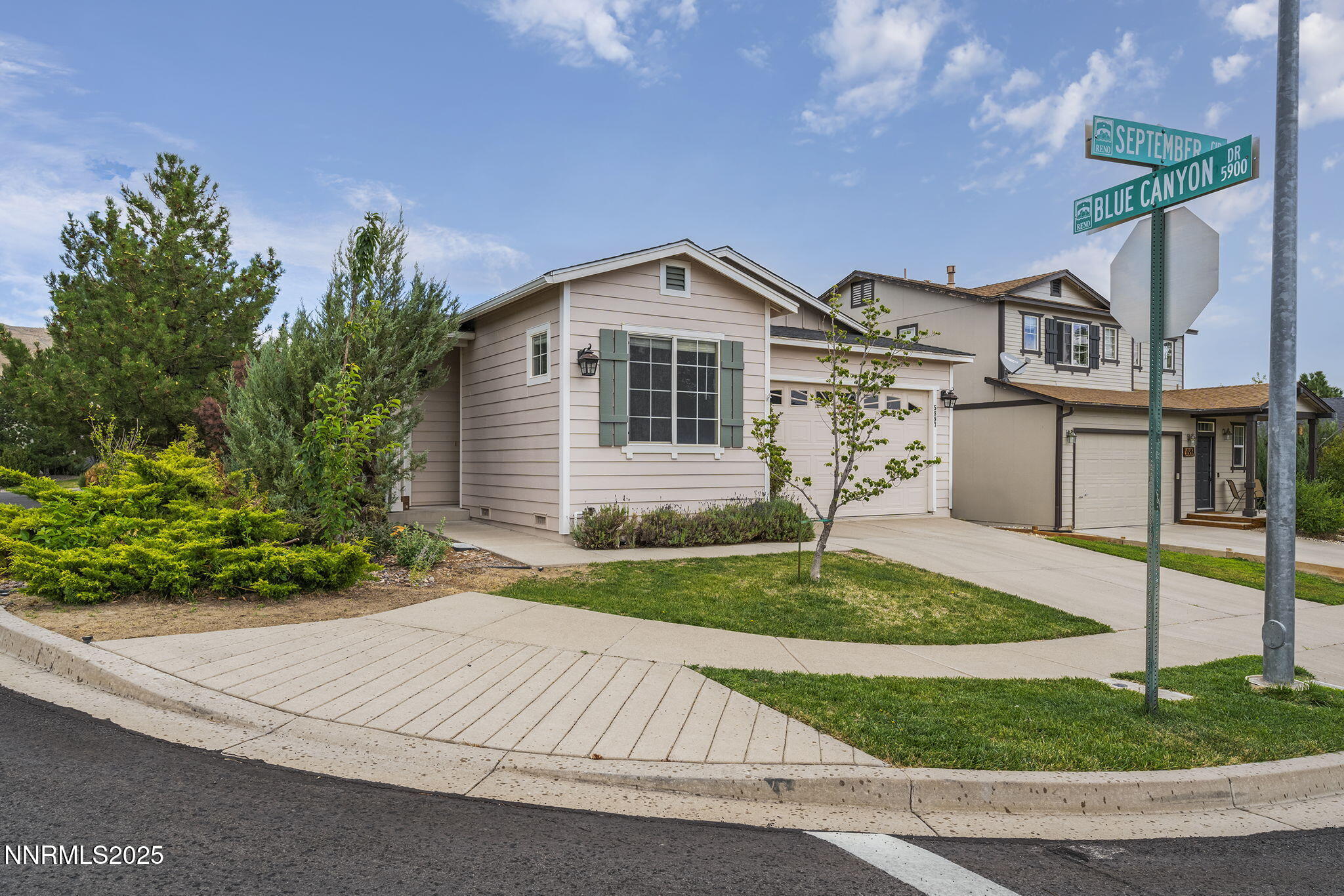 5897 September Circle Reno, NV 89523 - Photo 3 of 24 a front view of a house with garden
