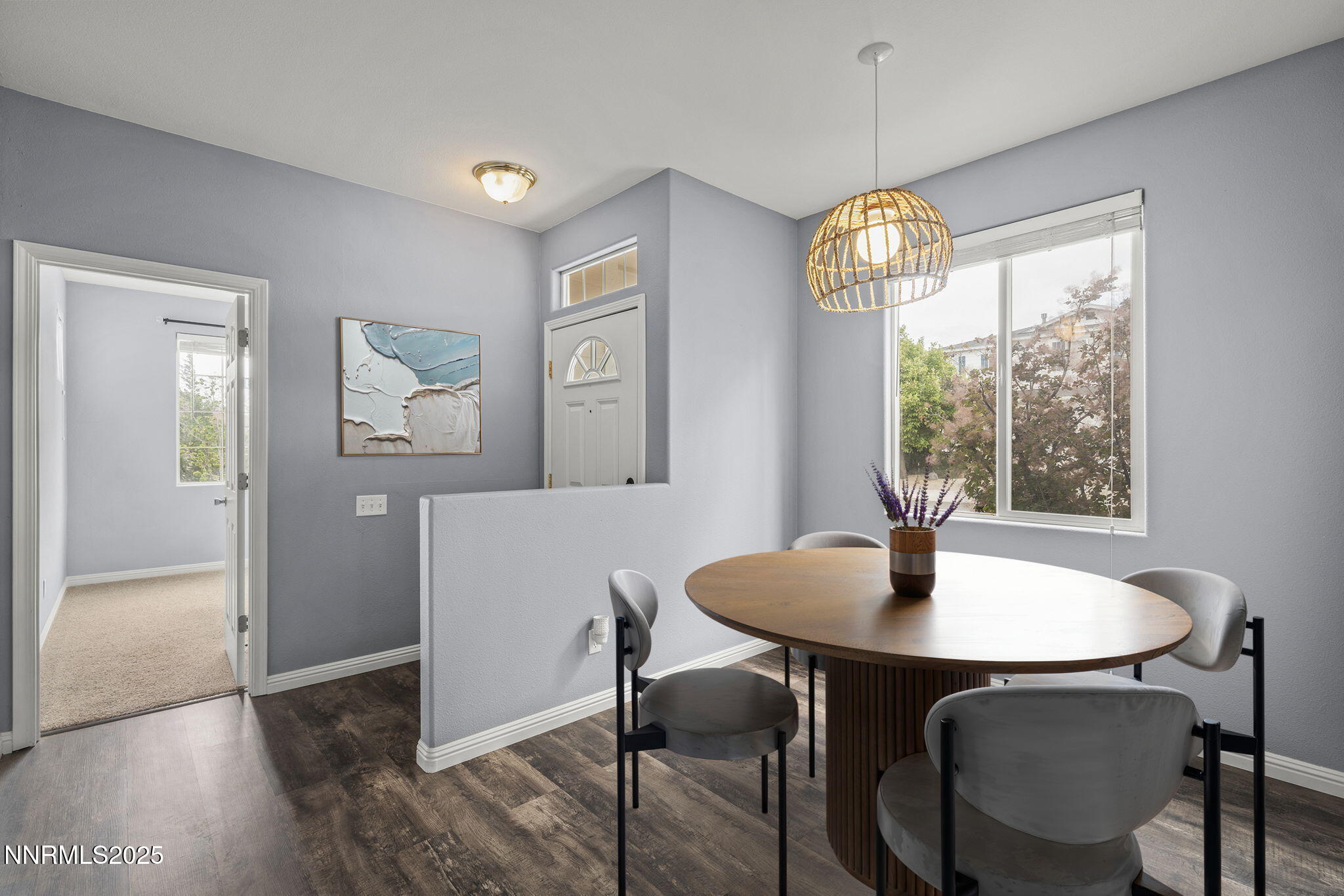5897 September Circle Reno, NV 89523 - Photo 5 of 24 a view of a dining room with furniture window and wooden floor