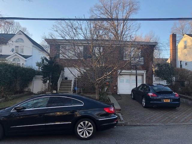 31 Brandon Road, Unit B1 Yonkers, NY 10704 - Photo 1 of 1 a car parked in front of a building
