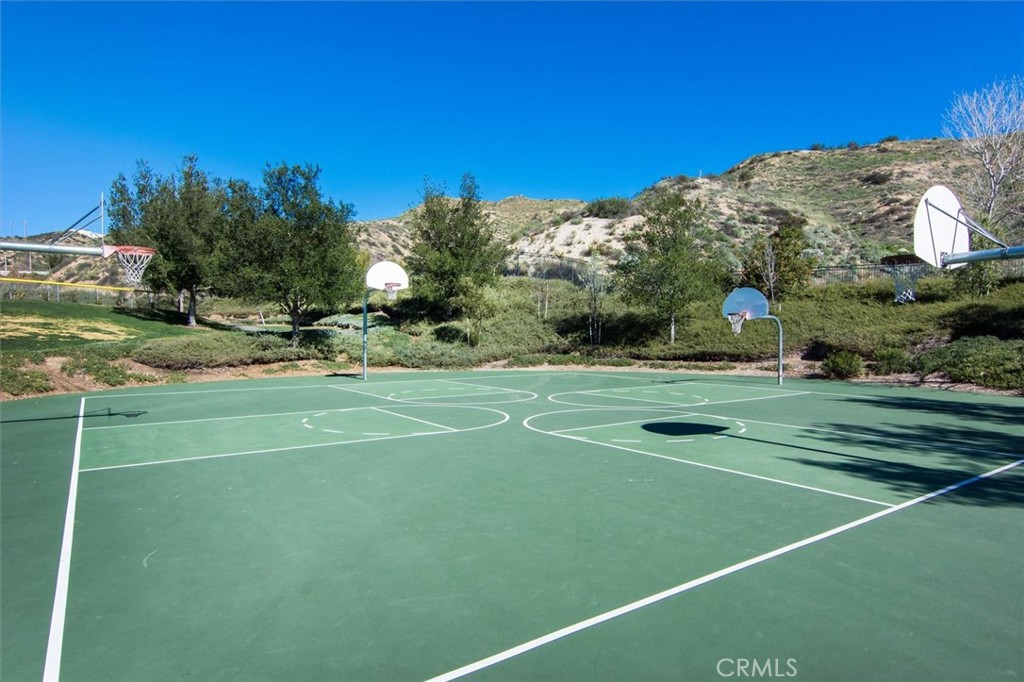 29370 Las Brisas Road Valencia, CA 91354 - Photo 51 of 57 “Enjoy the Tesoro de Valle Community Amenities” because it works for the pool, clubhouse, tennis, pickleball, parks, and other HOA photos.