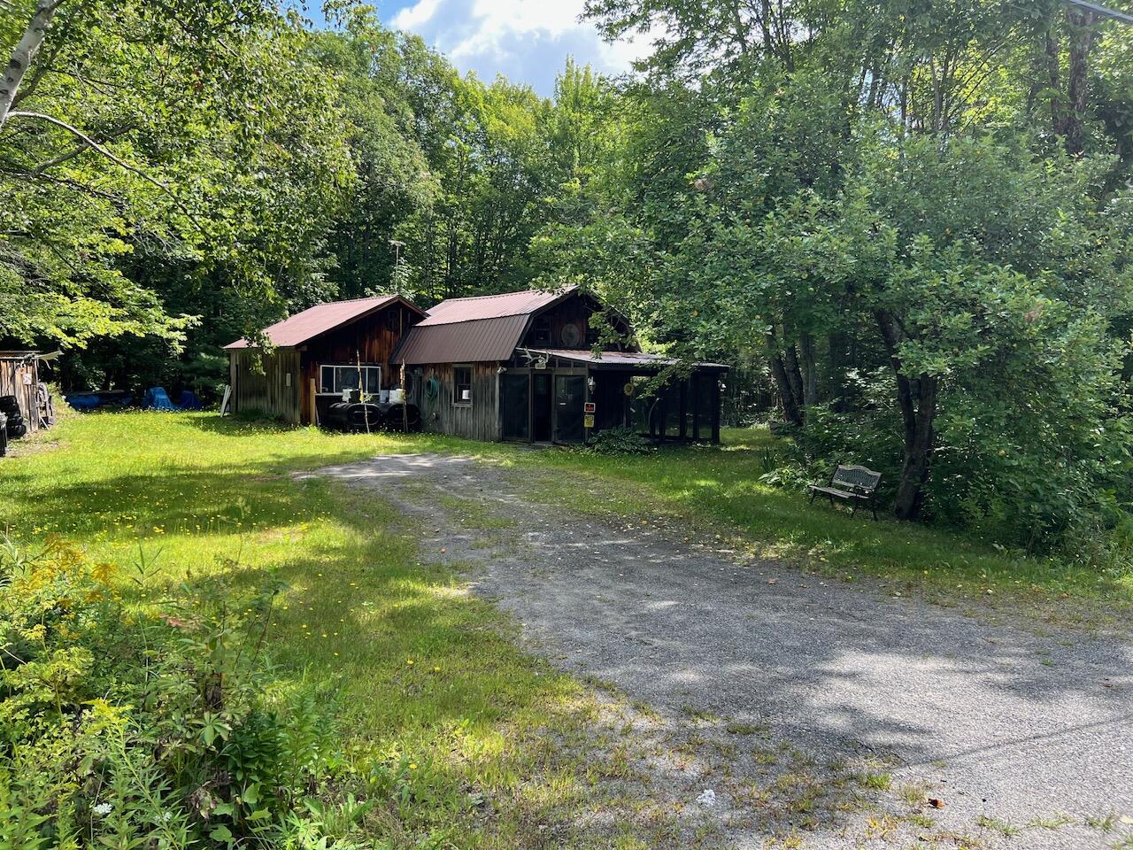 133 Hughes Road Sebec, ME 04481 - Photo 2 of 39 Front from road
