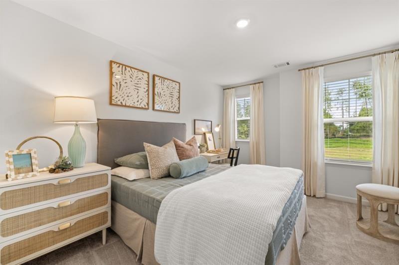 422 Red Dragon Drive Jefferson, GA 30549 - Photo 16 of 20 a bedroom with double bed and a window