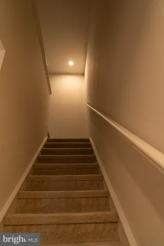 a bedroom with a bed and with furniture