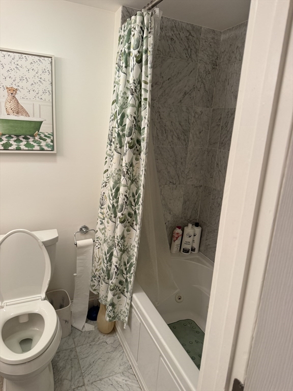 1914 Washington Street, Unit 4 Boston, MA 02118 - Photo 6 of 11 a bathroom with a toilet and a shower