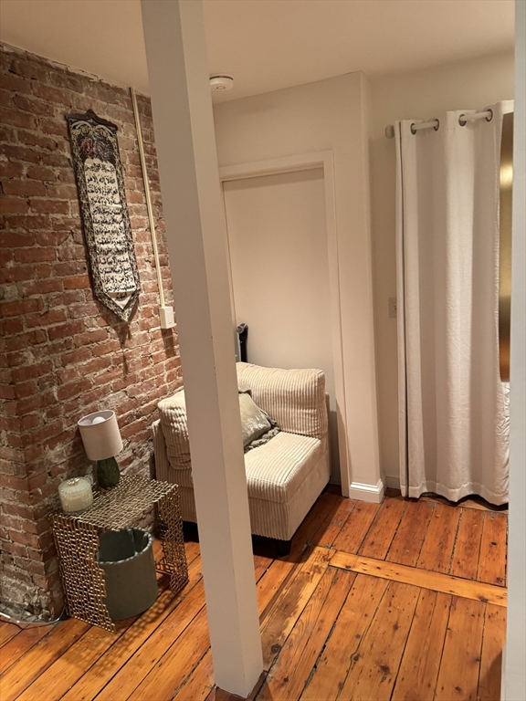 1914 Washington Street, Unit 4 Boston, MA 02118 - Photo 10 of 11 a bedroom with a bed and cabinets