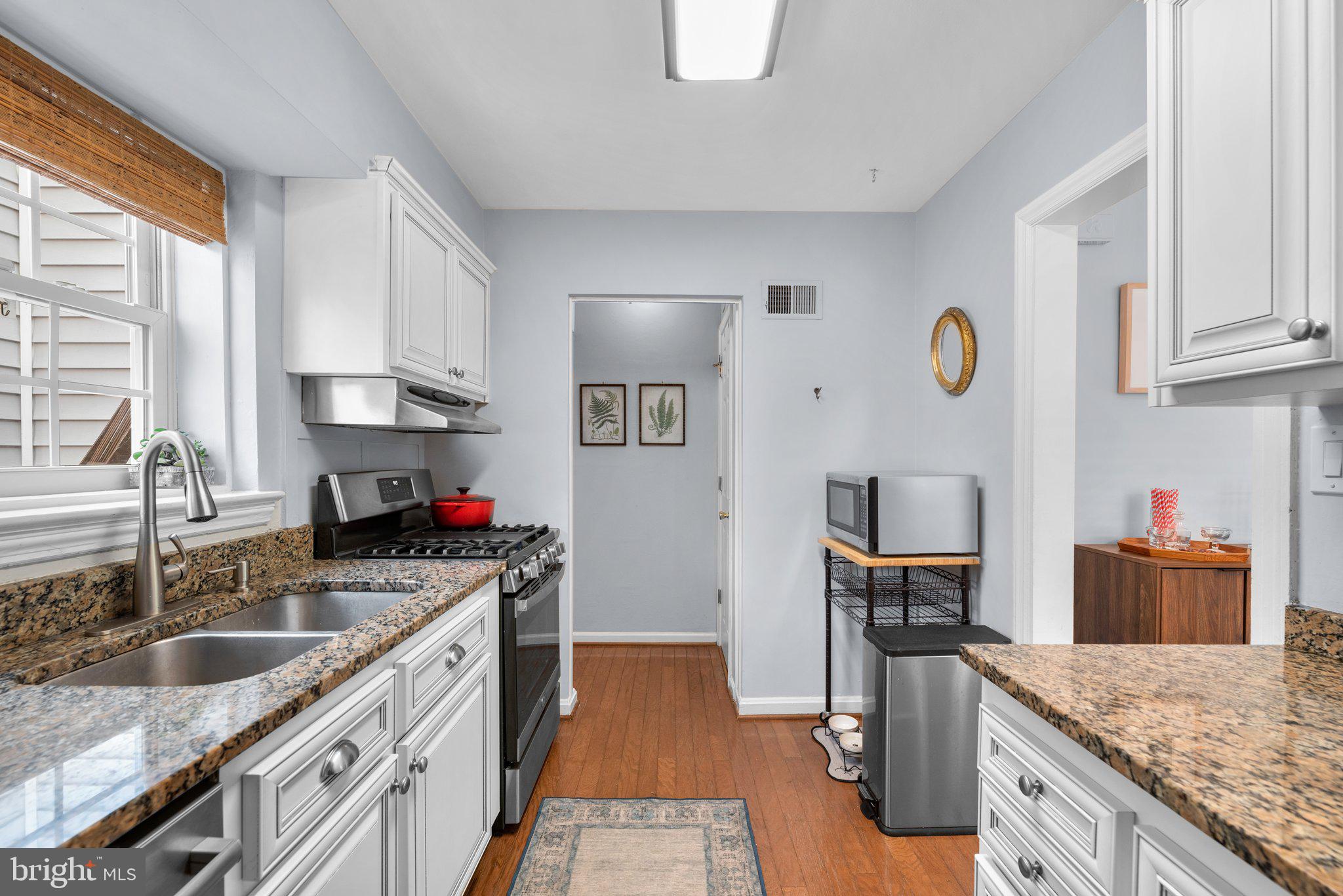 2419 Dennis Avenue Silver Spring, MD 20902 - Photo 14 of 41 Kitchen with stainless steel appliances