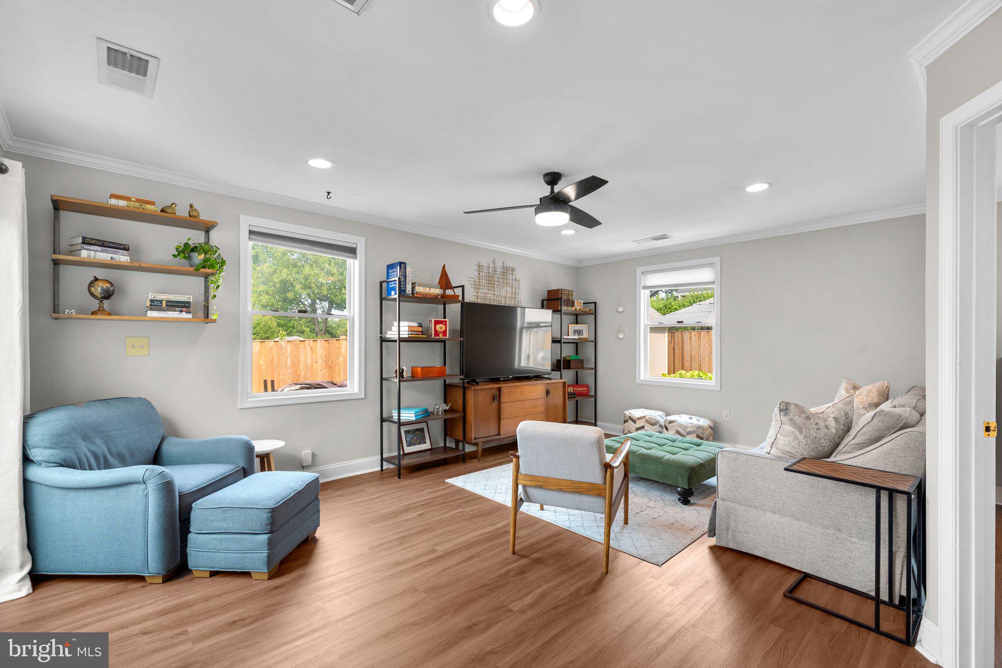 2419 Dennis Avenue Silver Spring, MD 20902 - Photo 23 of 41 Family Room with new laminate floors (2020)