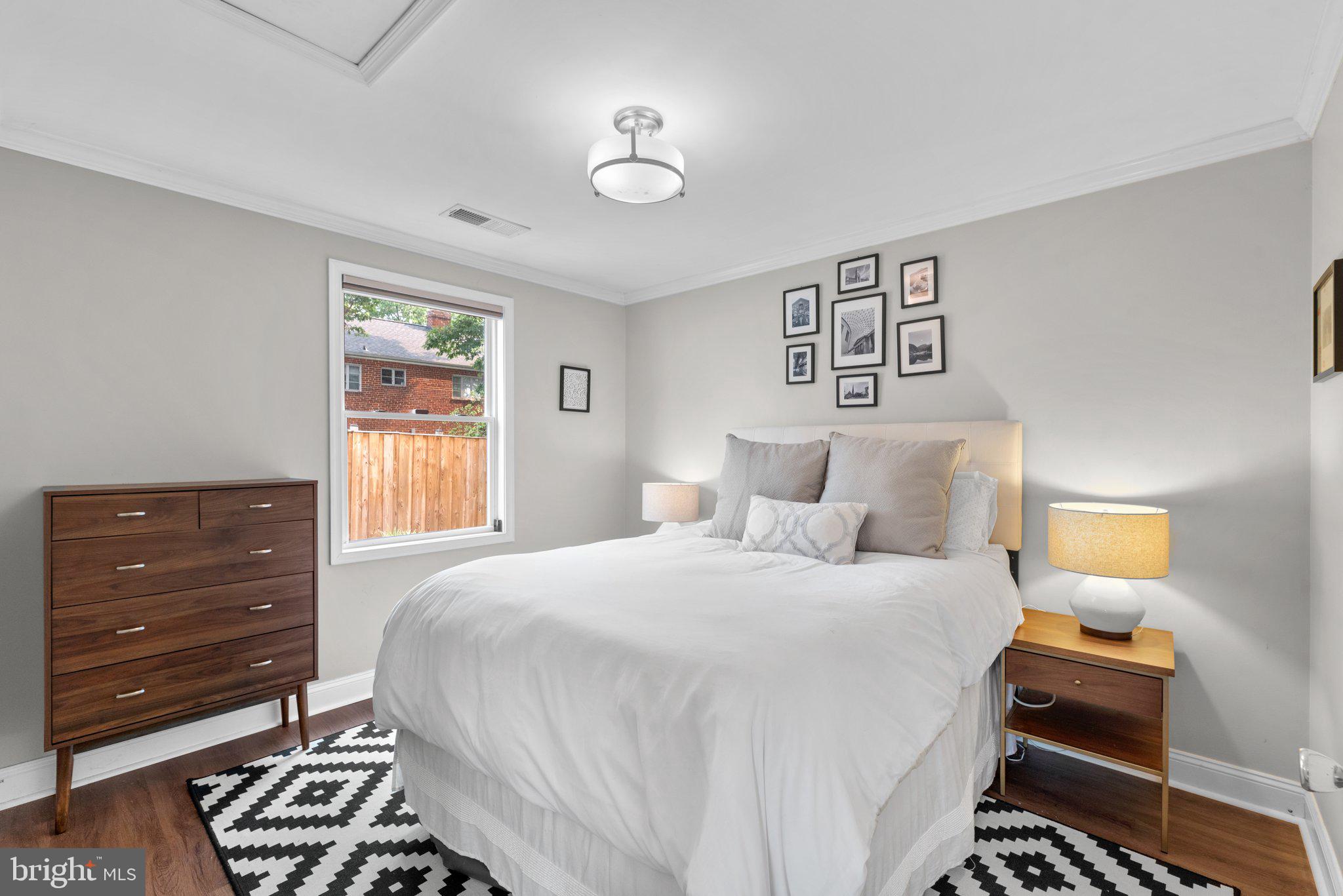 2419 Dennis Avenue Silver Spring, MD 20902 - Photo 28 of 41 Primary Suite with new laminate floors (2020)