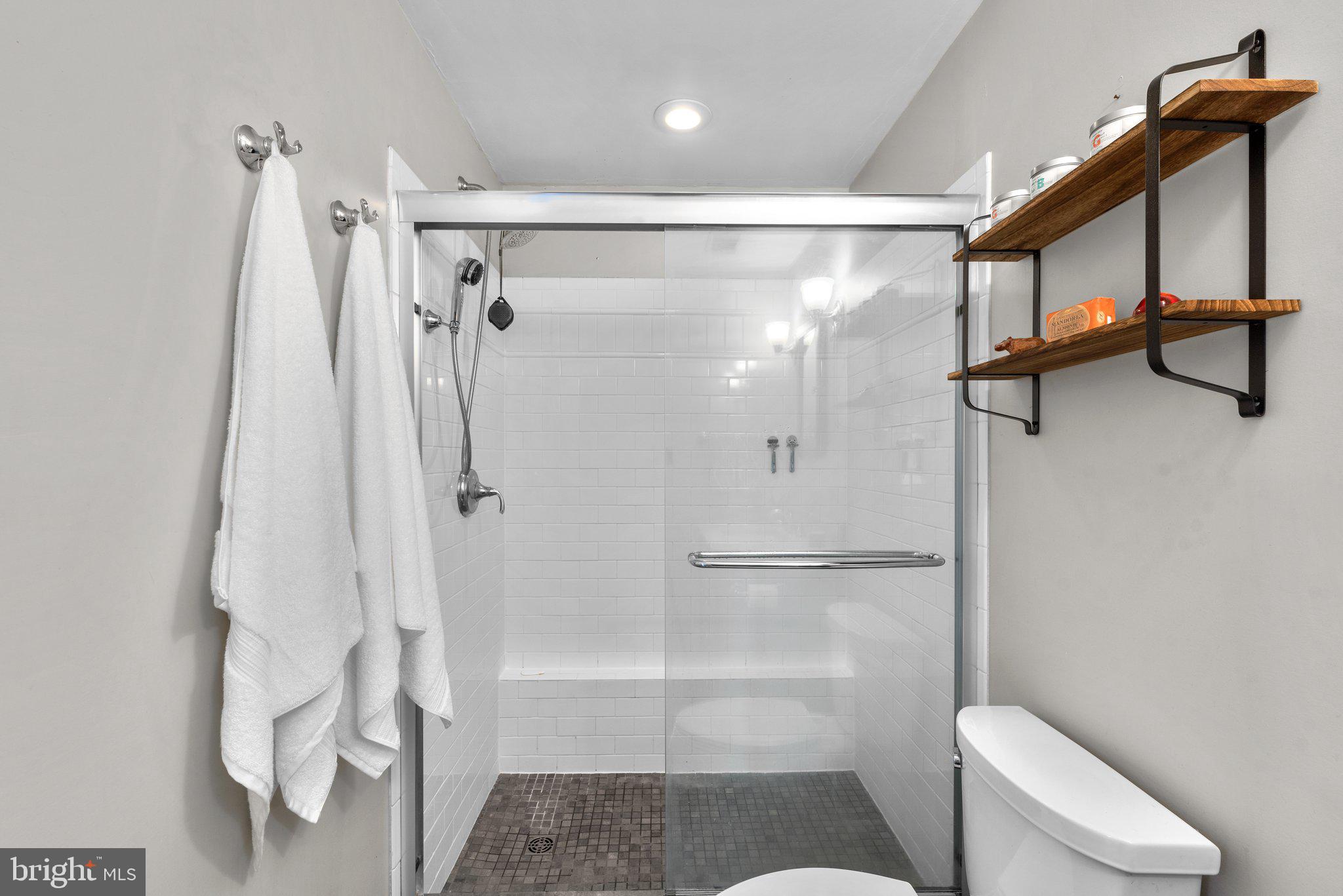 2419 Dennis Avenue Silver Spring, MD 20902 - Photo 32 of 41 Full Updated Bathroom #2 with sliding glass doors