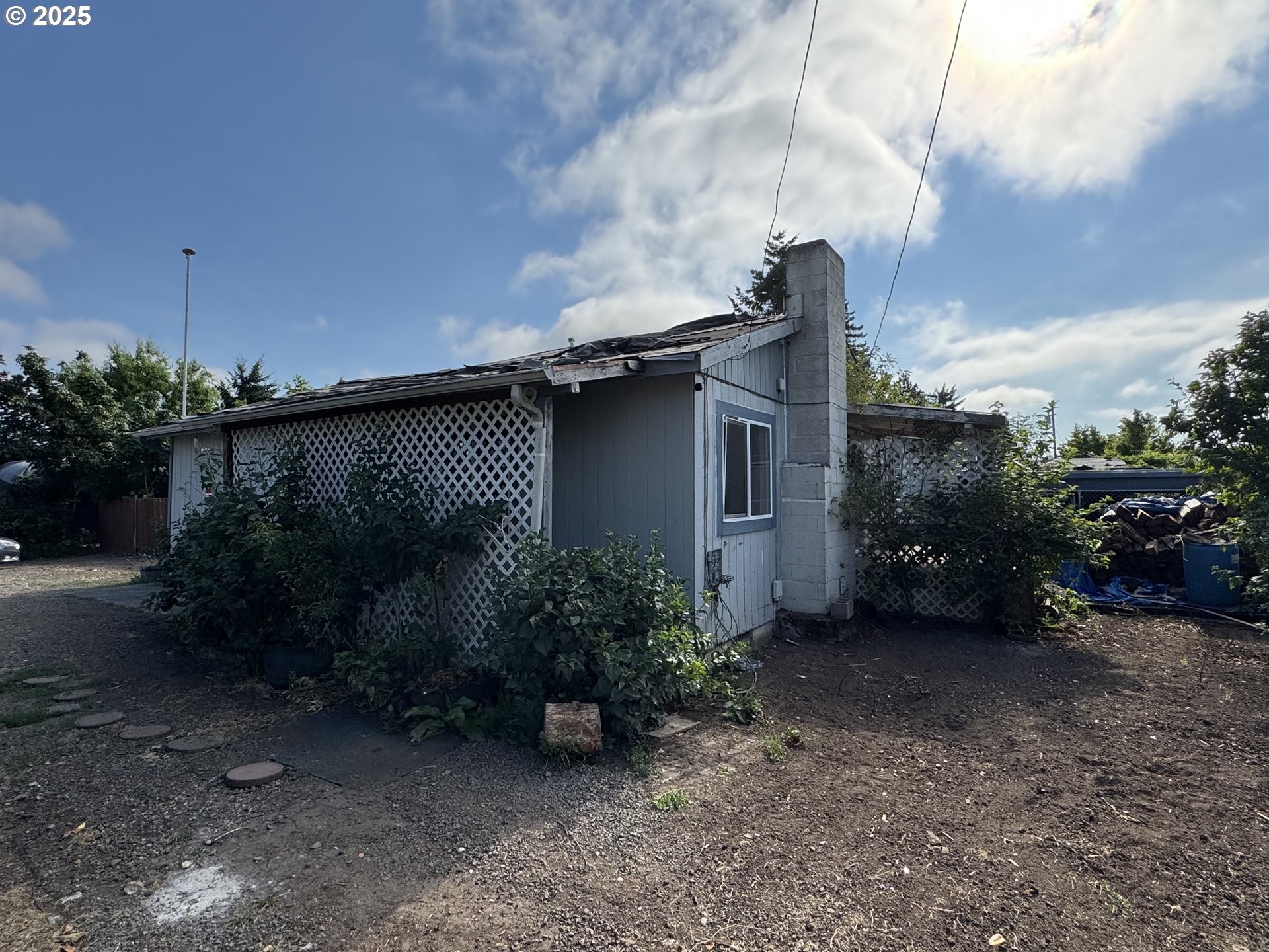255 36th Street Springfield, OR 97478 - Photo 1 of 11 a backyard of a house with lots of green space