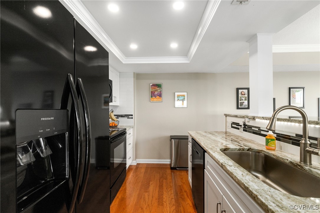 2956 Hathaway Road, Unit U912 Richmond, VA 23225 - Photo 11 of 29 a kitchen with stainless steel appliances granite countertop a sink stove and refrigerator