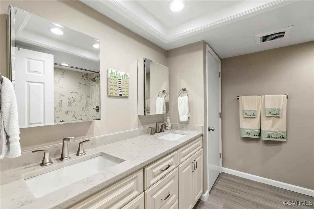 2956 Hathaway Road, Unit U912 Richmond, VA 23225 - Photo 15 of 29 a bathroom with a granite countertop double vanity sink and a mirror