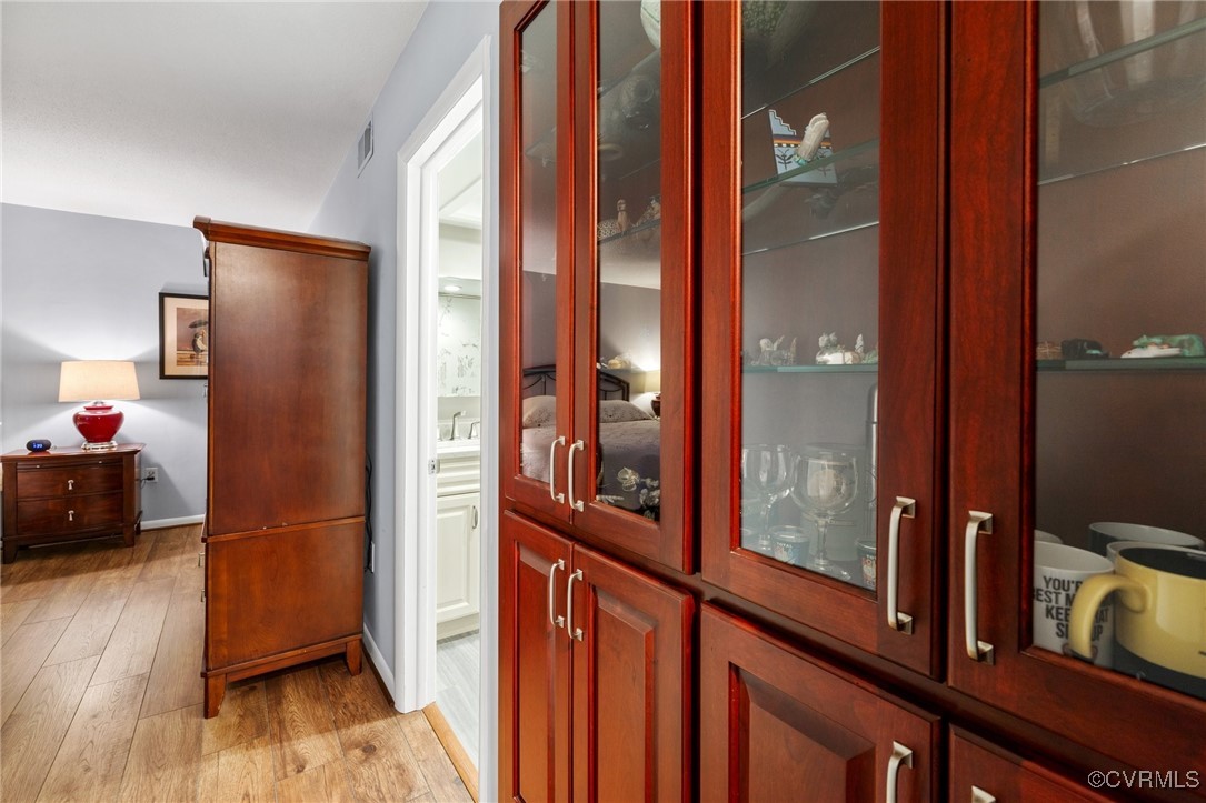 2956 Hathaway Road, Unit U912 Richmond, VA 23225 - Photo 19 of 29 a view of a hallway with wooden floor and furniture