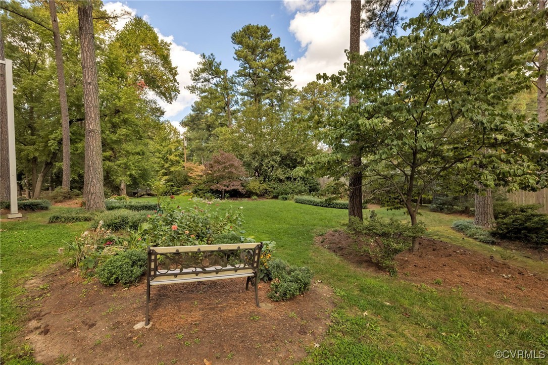 2956 Hathaway Road, Unit U912 Richmond, VA 23225 - Photo 28 of 29 a view of a bench in a garden