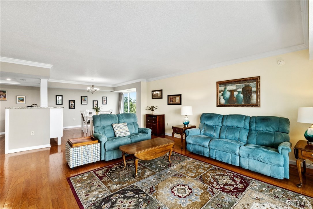 2956 Hathaway Road, Unit U912 Richmond, VA 23225 - Photo 5 of 29 a living room with furniture and wooden floor