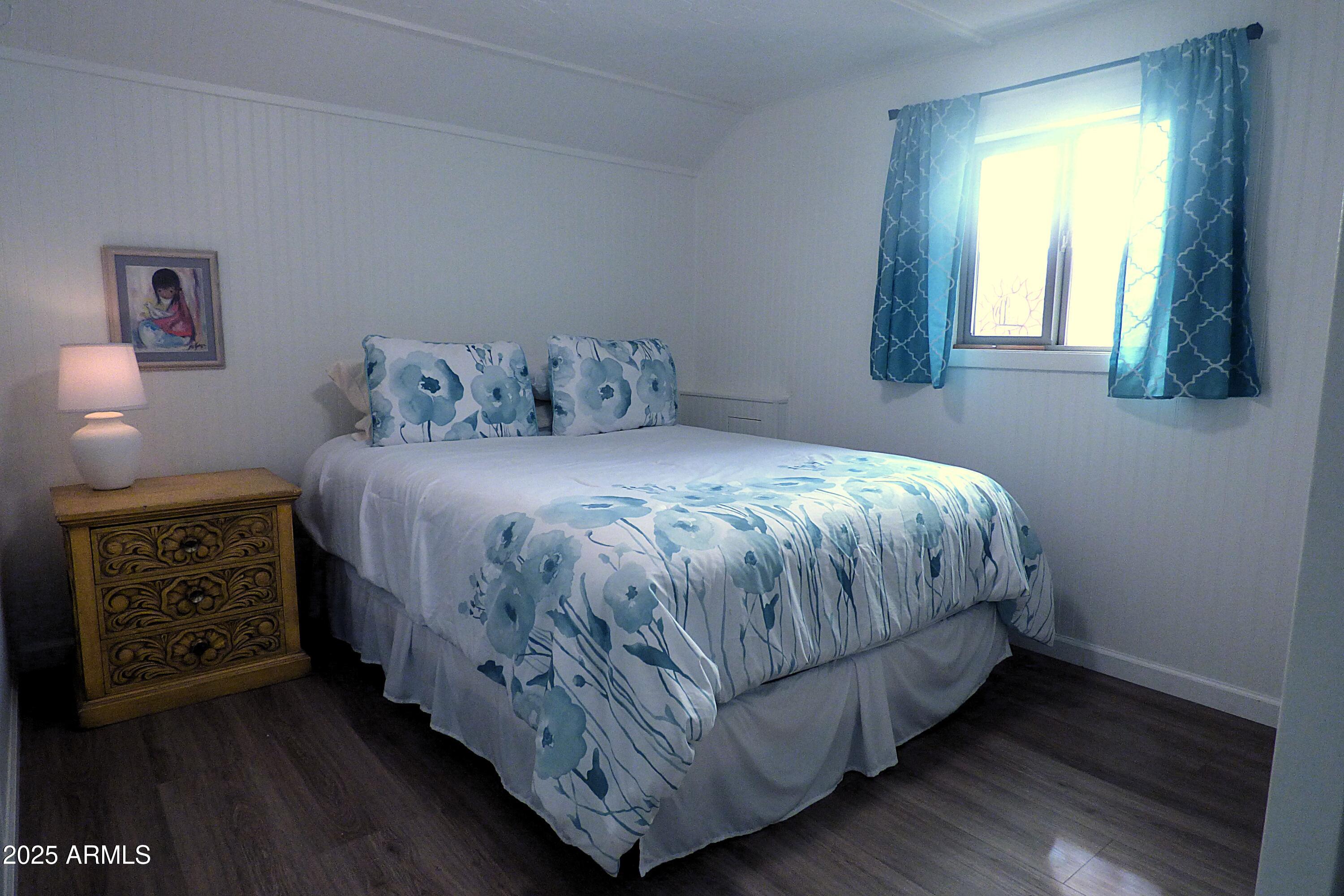 6700 East Thomas Road, Unit 34 Scottsdale, AZ 85251 - Photo 19 of 69 a bedroom with a bed and a window
