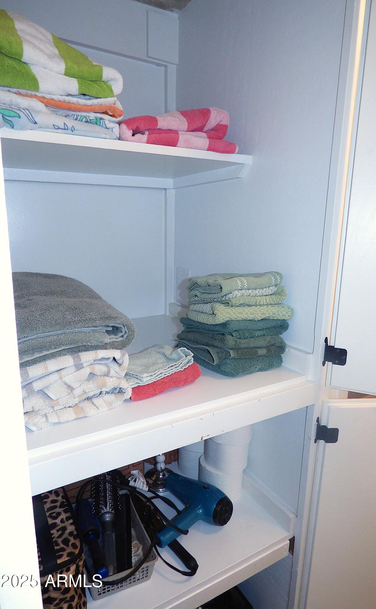6700 East Thomas Road, Unit 34 Scottsdale, AZ 85251 - Photo 30 of 71 a bathroom with a sink and a mirror