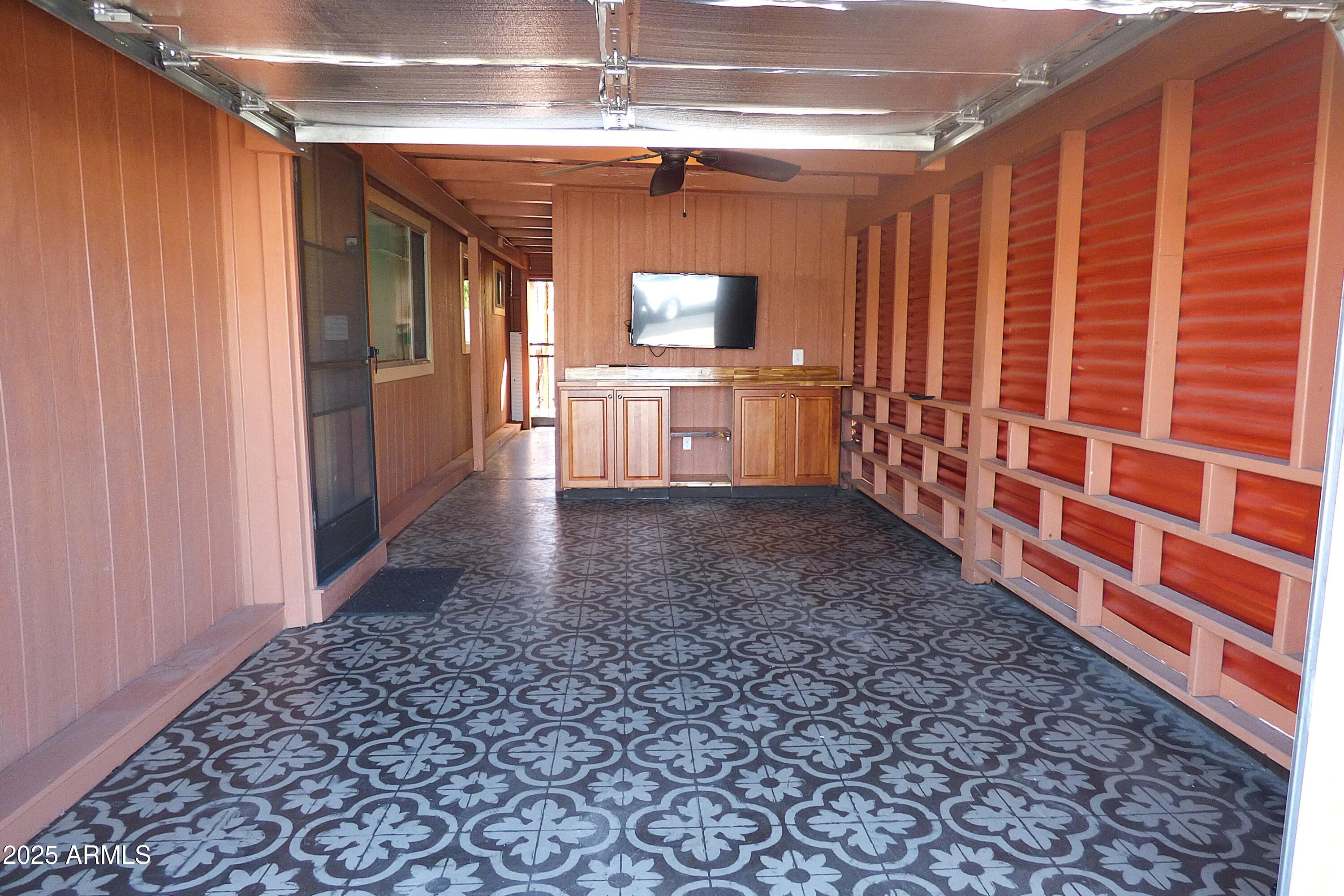 6700 East Thomas Road, Unit 34 Scottsdale, AZ 85251 - Photo 31 of 69 a view of a hallway with wooden floor