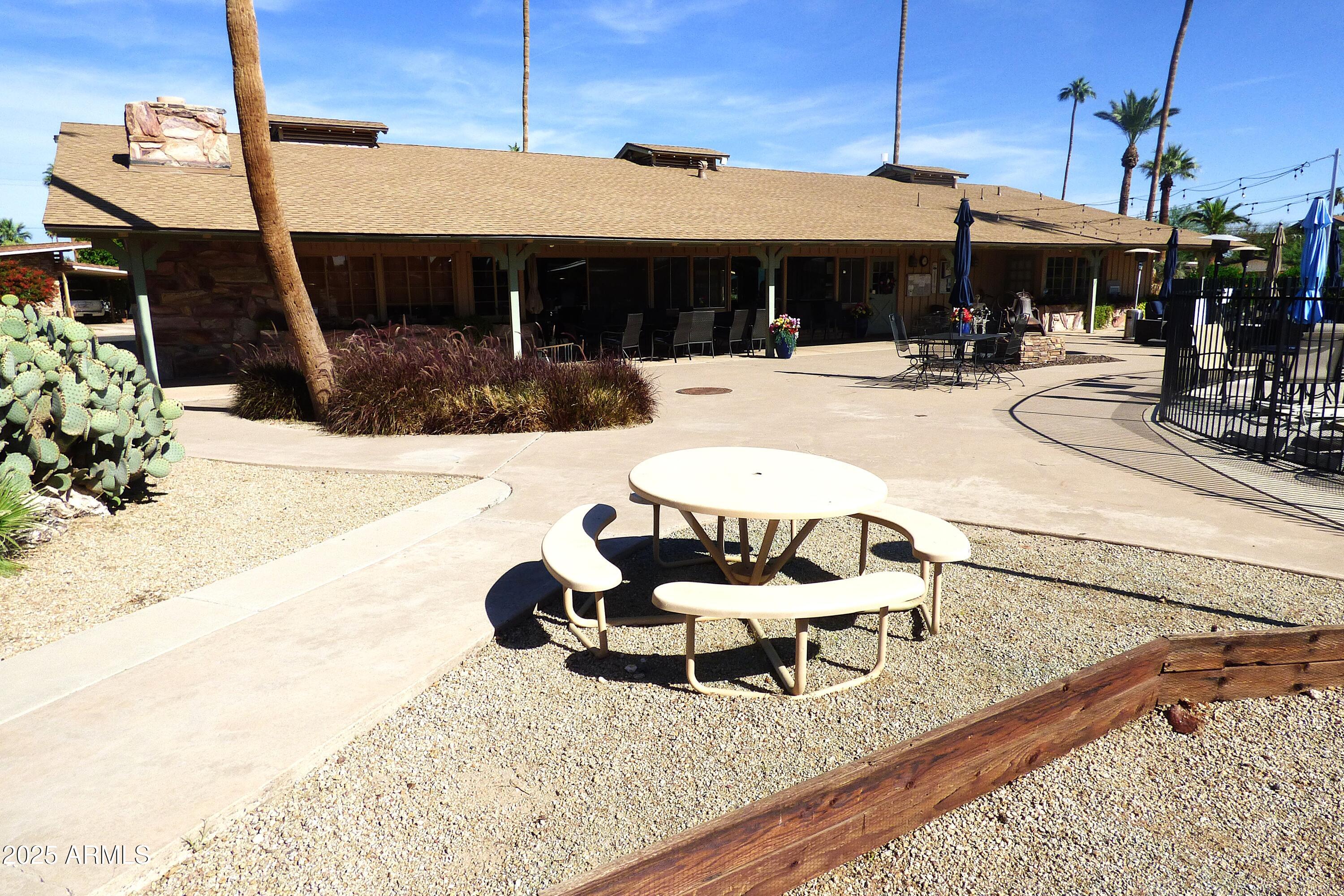 6700 East Thomas Road, Unit 34 Scottsdale, AZ 85251 - Photo 46 of 71 a outdoor space with lots of white furniture