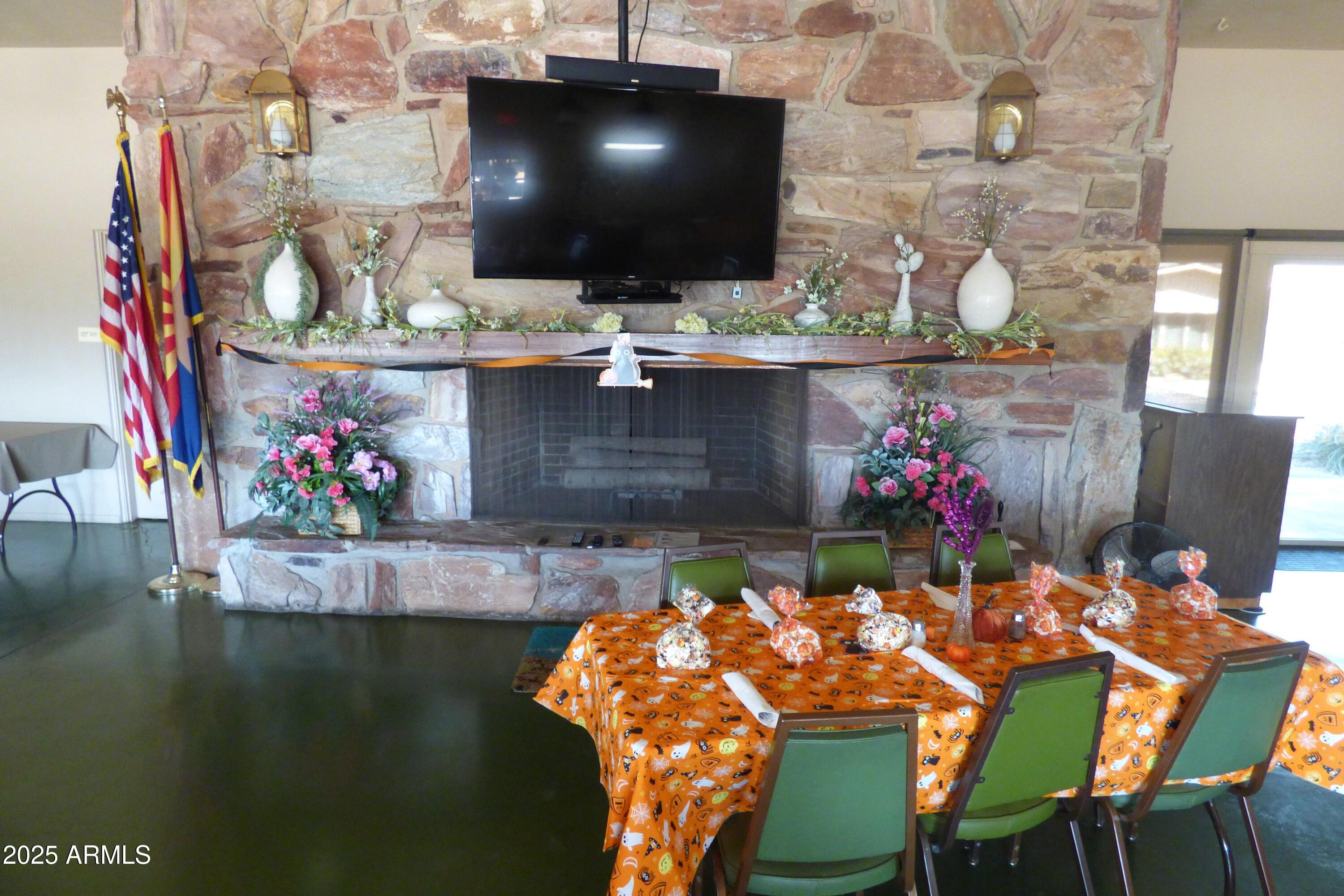 6700 East Thomas Road, Unit 34 Scottsdale, AZ 85251 - Photo 56 of 69 a view of a dining room with furniture and wooden floor