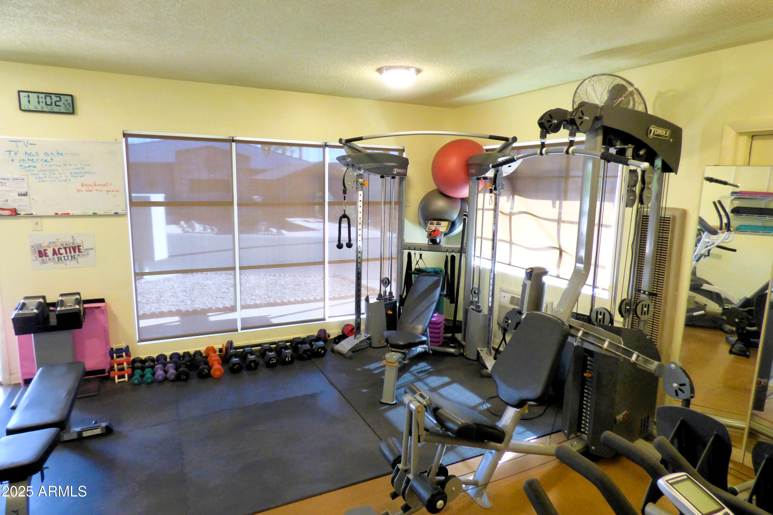 6700 East Thomas Road, Unit 34 Scottsdale, AZ 85251 - Photo 63 of 69 a view of a room with gym equipment