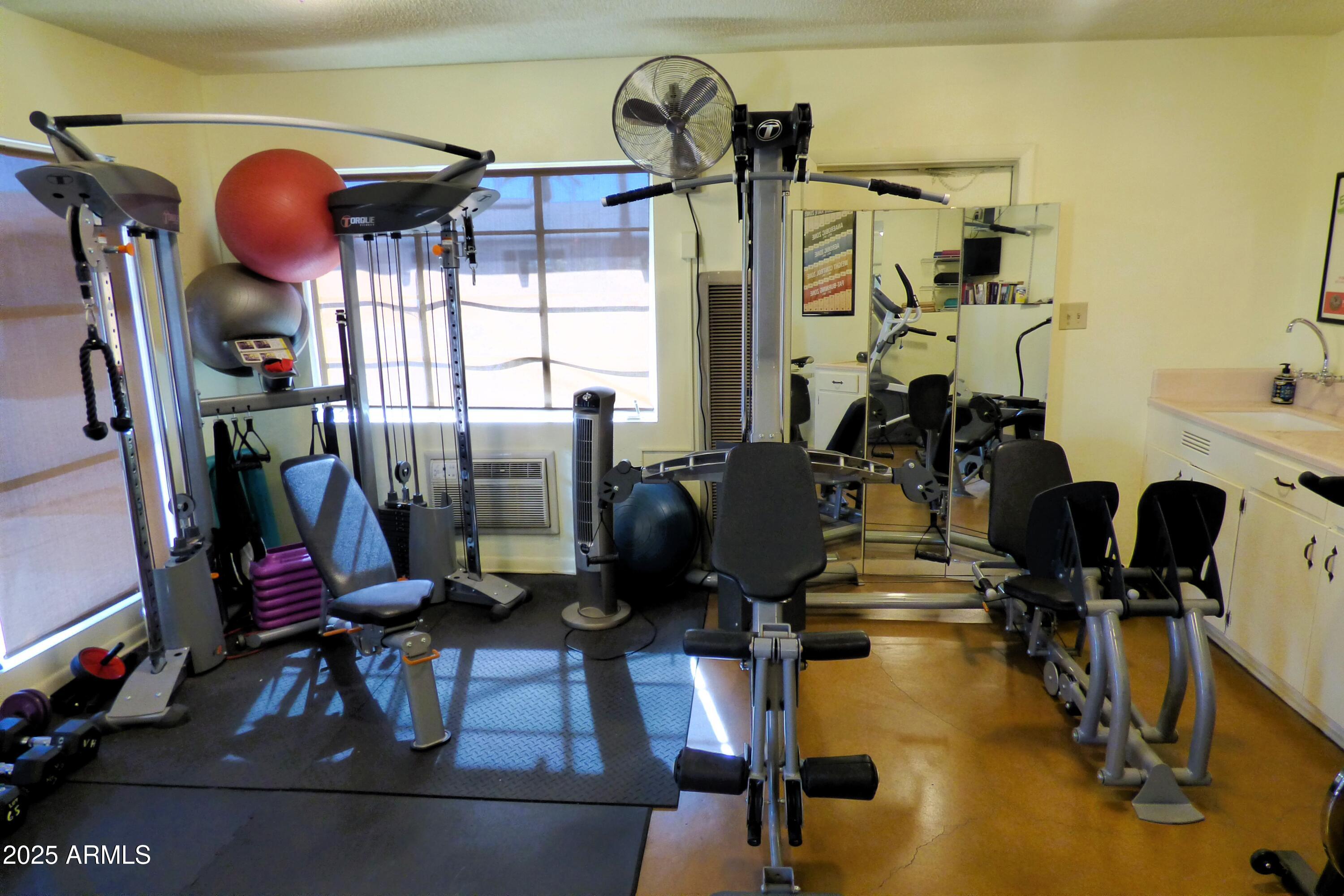 6700 East Thomas Road, Unit 34 Scottsdale, AZ 85251 - Photo 67 of 69 a view of a room with gym equipment