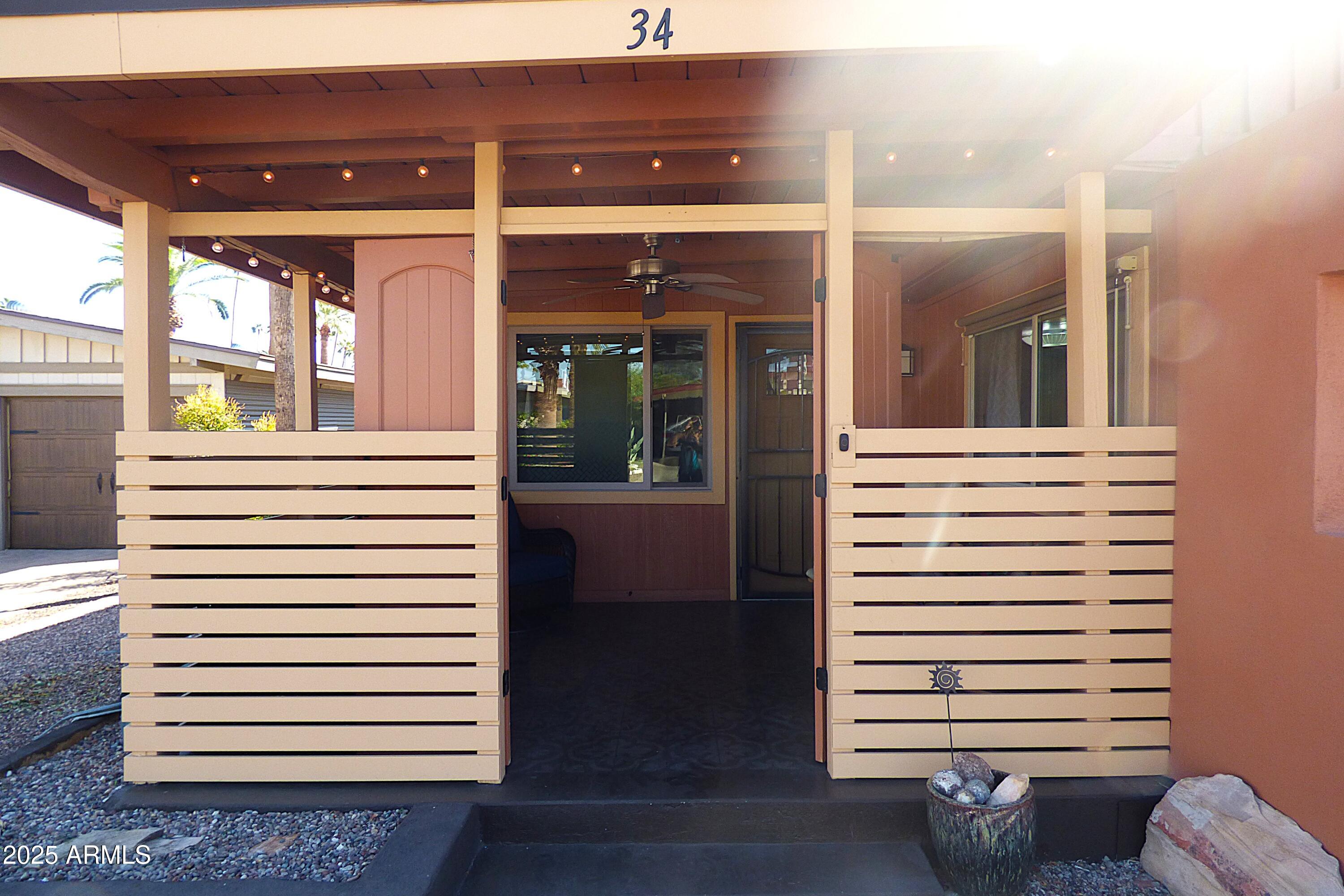 6700 East Thomas Road, Unit 34 Scottsdale, AZ 85251 - Photo 7 of 71 a view of a porch with a door