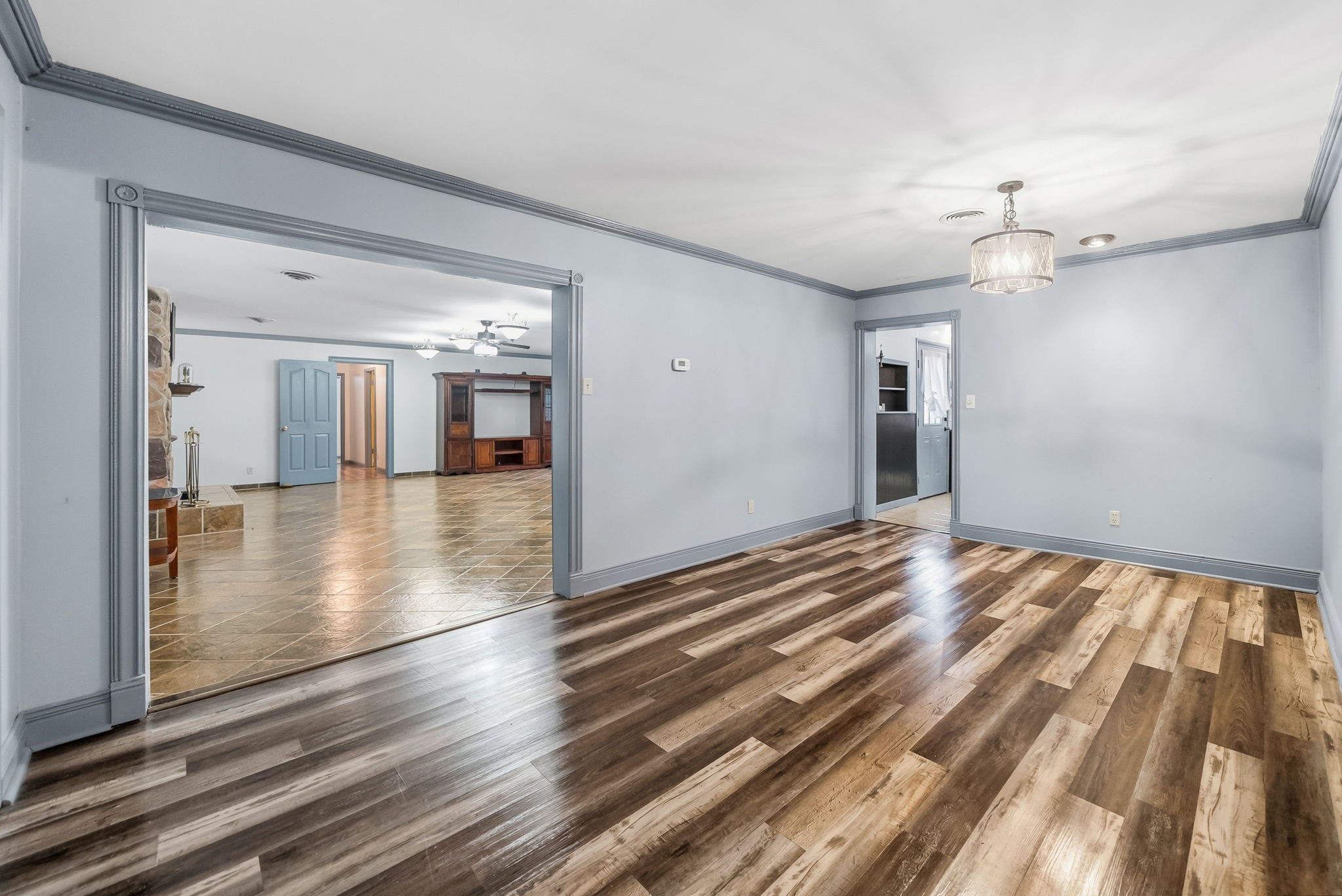 369 Holiday Acres Drive Springville, TN 38256 - Photo 16 of 100 wooden floor in an empty room with a window