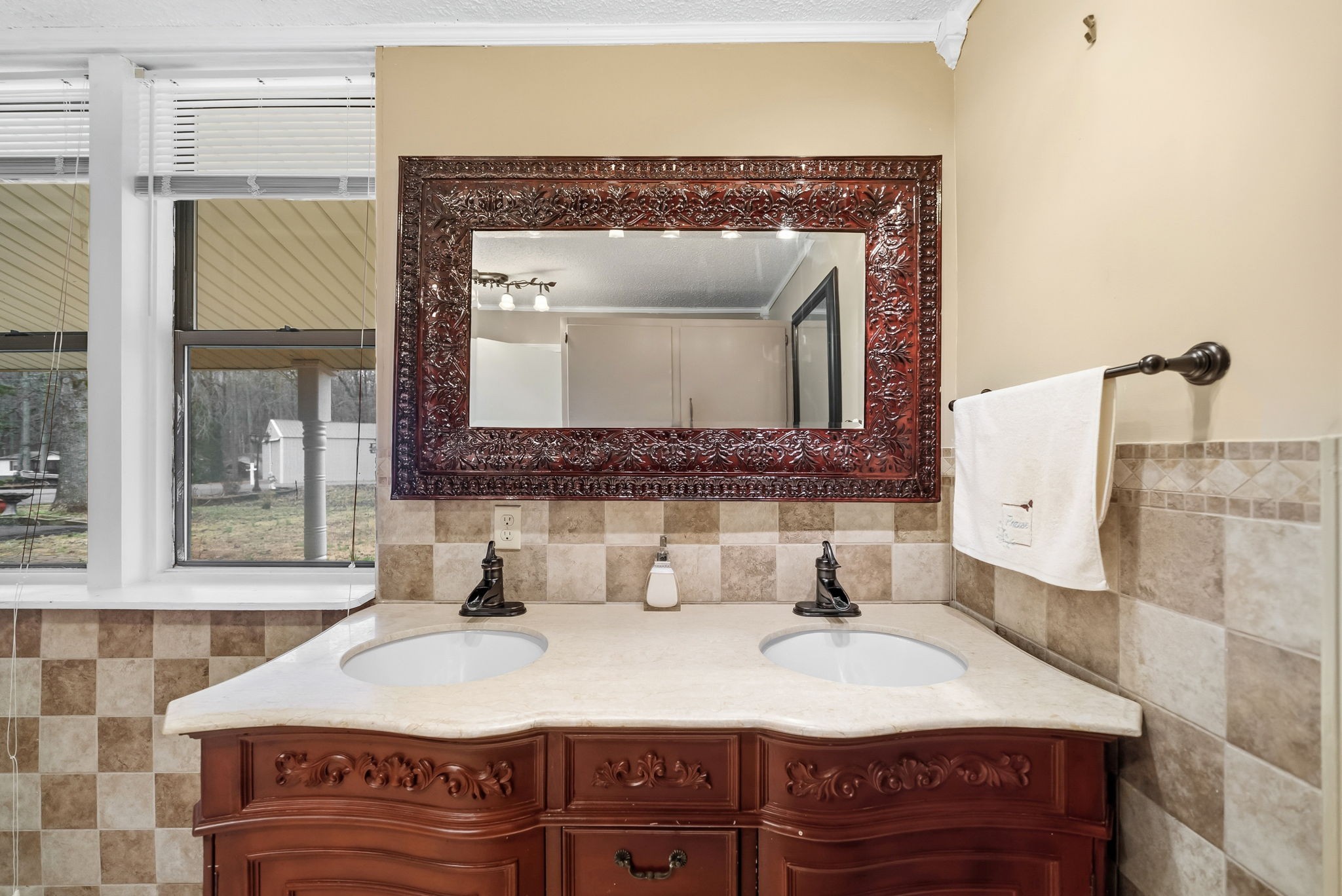369 Holiday Acres Drive Springville, TN 38256 - Photo 35 of 100 a bathroom with a sink vanity and mirror