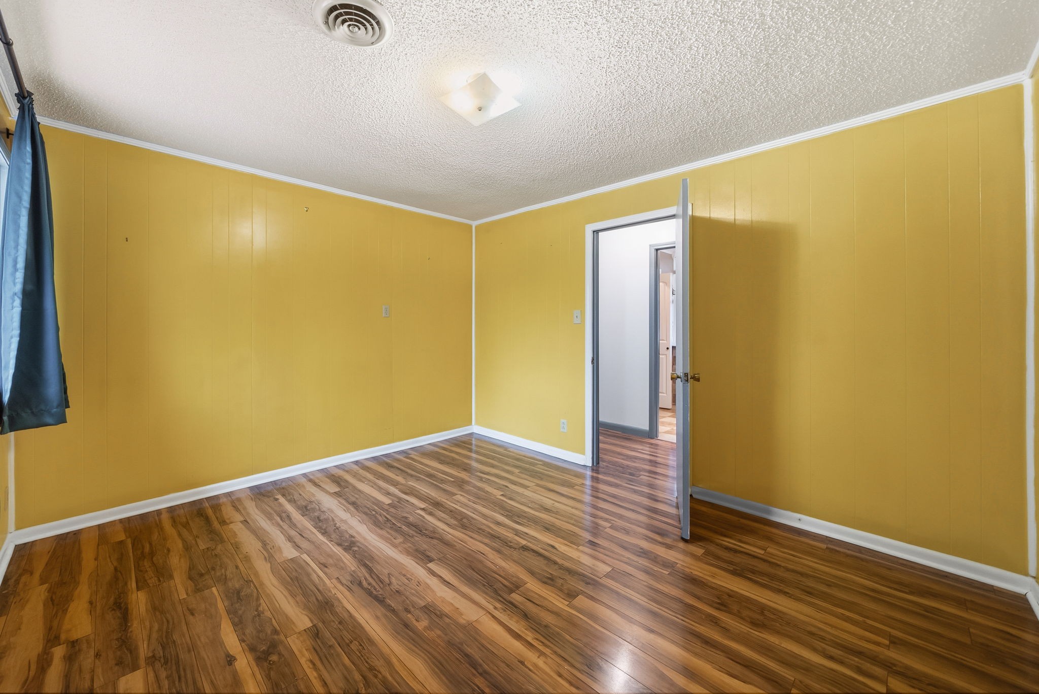 369 Holiday Acres Drive Springville, TN 38256 - Photo 38 of 100 a view of an empty room with wooden floor