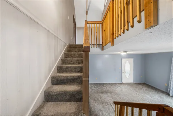 a kitchen with stainless steel appliances granite countertop a sink and cabinets