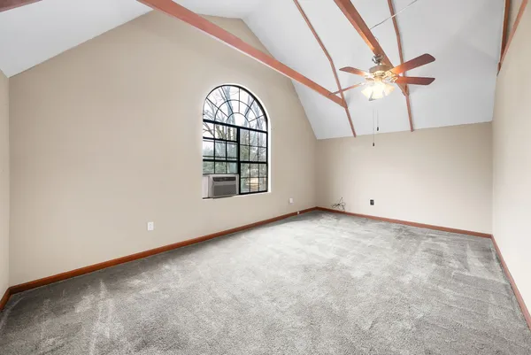 a view of a balcony with wooden floor