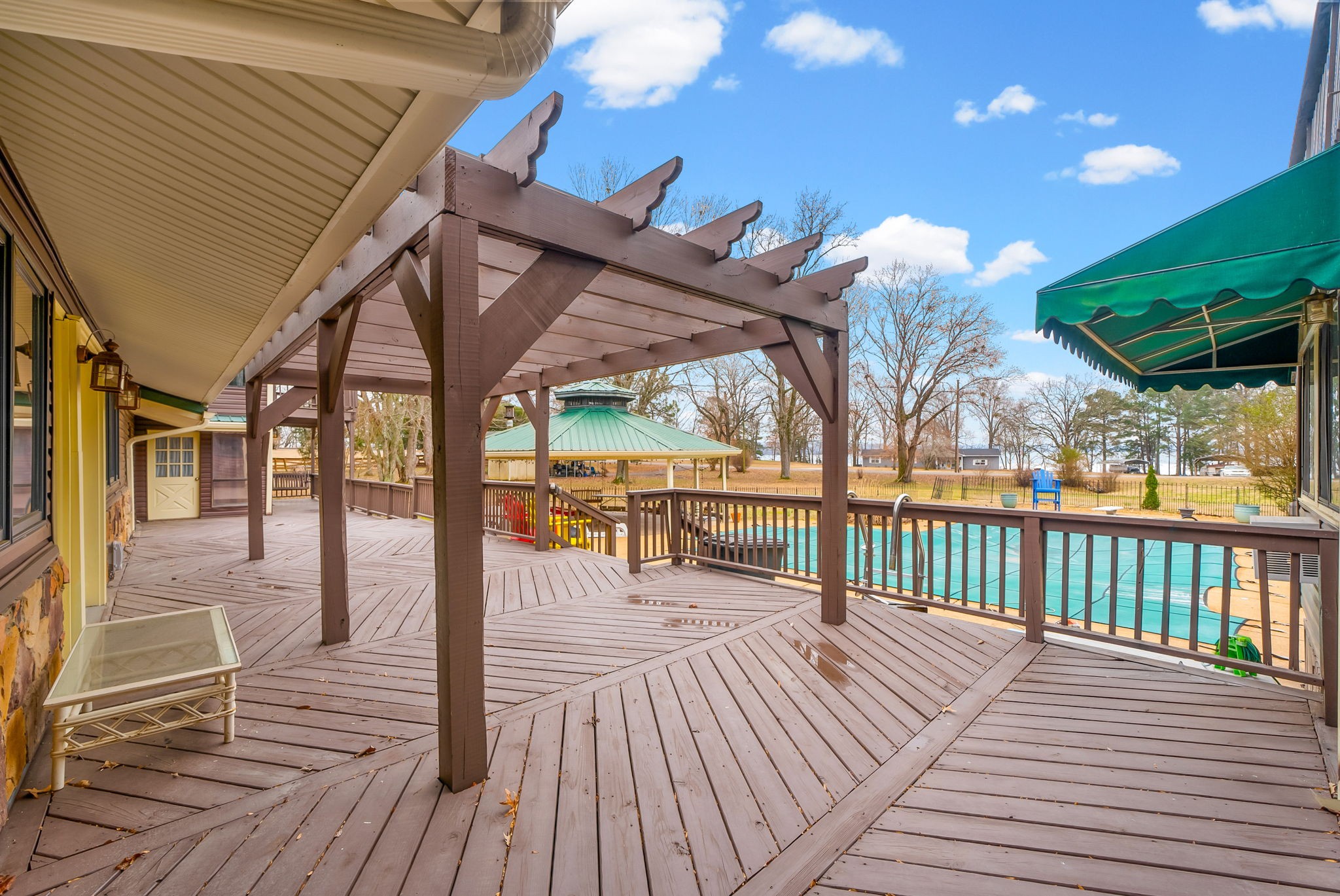 369 Holiday Acres Drive Springville, TN 38256 - Photo 80 of 100 a view of a balcony with wooden floor
