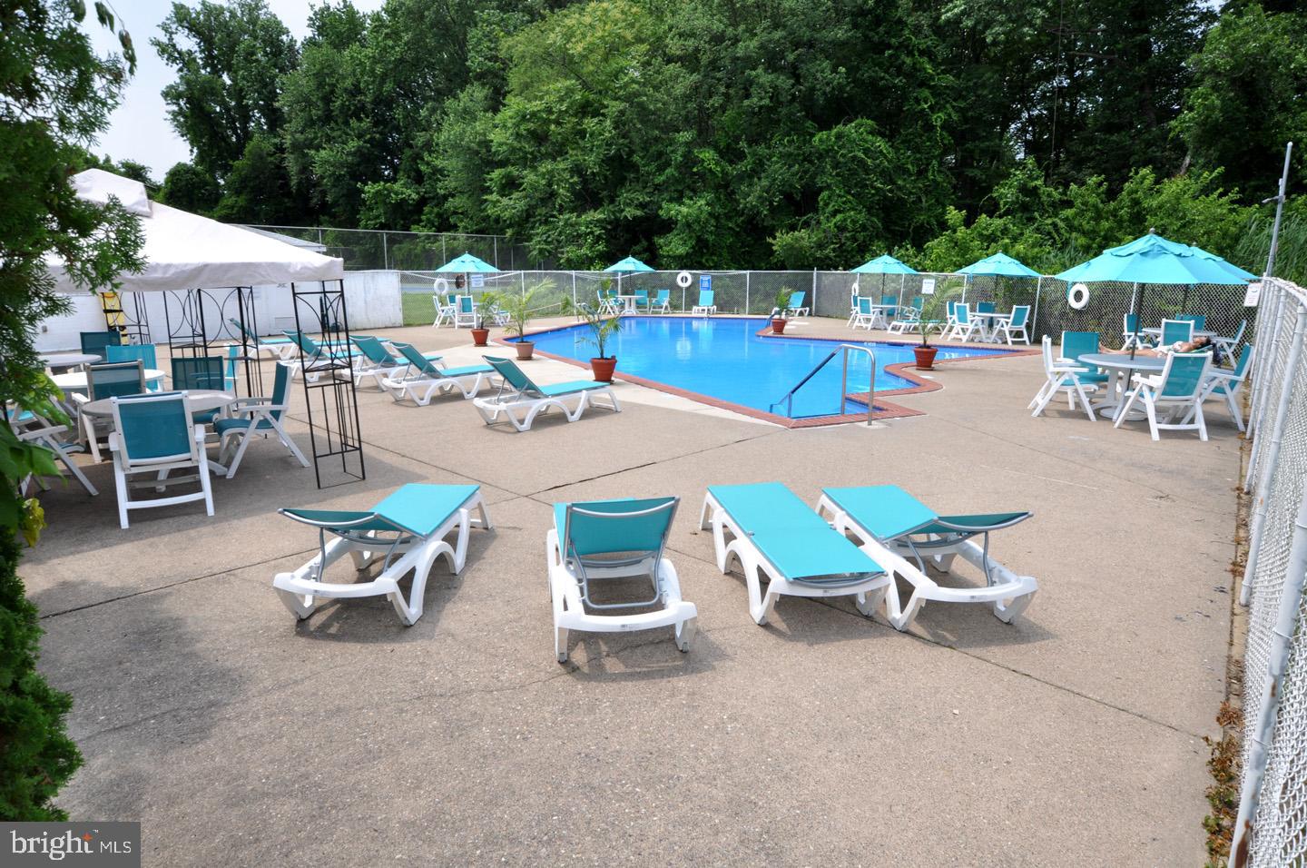 1840 Frontage Road, Unit 607 Cherry Hill, NJ 08034 - Photo 20 of 21 Serene poolside retreat for relaxation.
