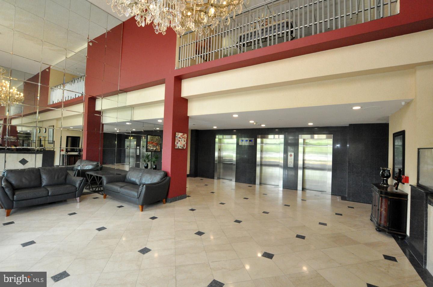1840 Frontage Road, Unit 607 Cherry Hill, NJ 08034 - Photo 2 of 21 Elegant lobby with modern design elements.
