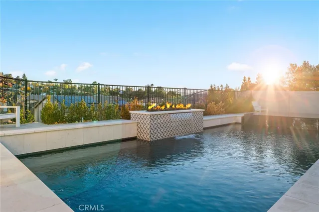 a front view of a house with swimming pool