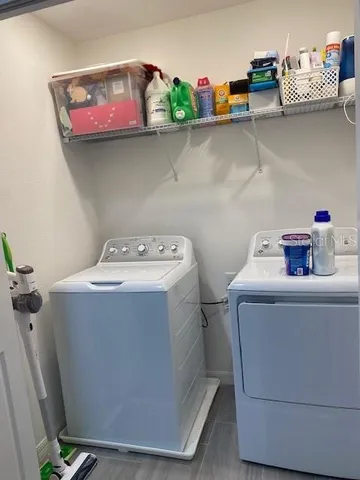 a utility room with dryer and washer