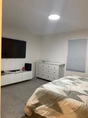 a view of a livingroom with furniture