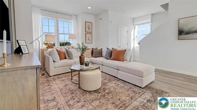 a living room with furniture and a couch