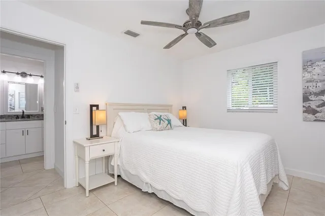 a view of a swimming pool with lounge chairs