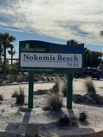 an aerial view of a city with ocean view