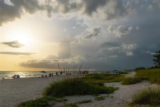a view of a building with a yard