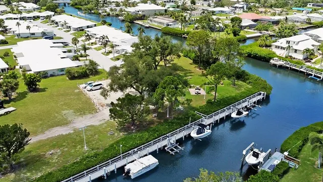 a view of a lake with sitting area