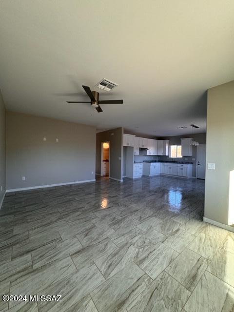 154 Calle Victoria Rio Rico, AZ 85648 - Photo 7 of 27 a view of empty room with wooden floor