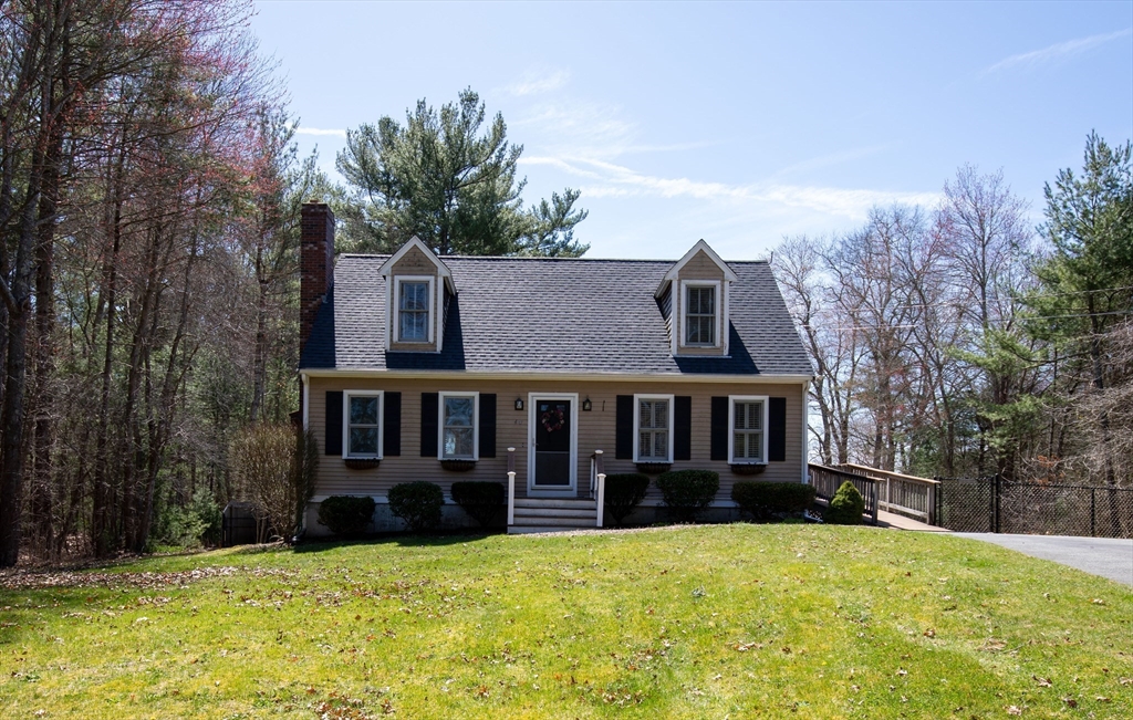 40 Pine Street Carver, MA 02330 - Photo 1 of 30 a view of a house with yard and sitting area