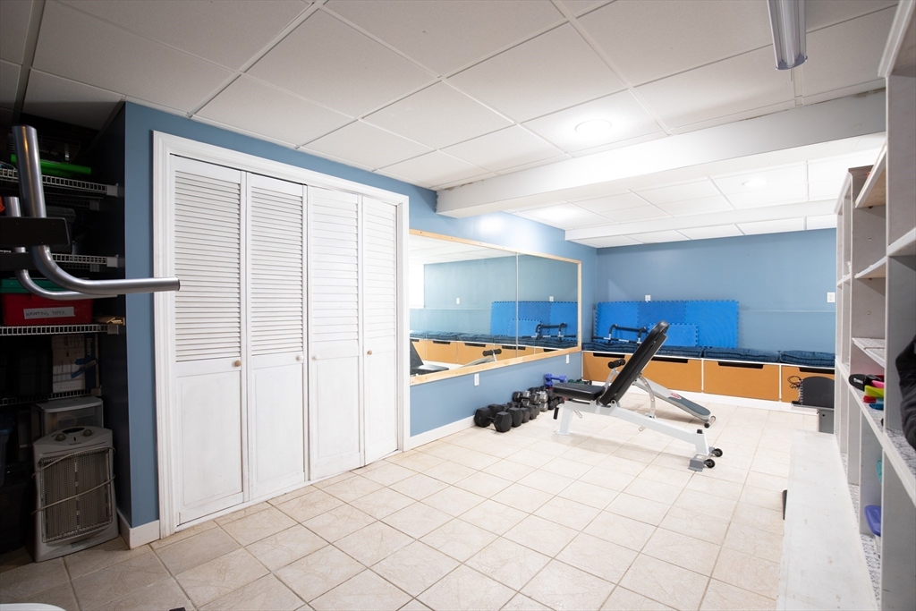 40 Pine Street Carver, MA 02330 - Photo 17 of 30 a bedroom with a bed and a lamp on dresser