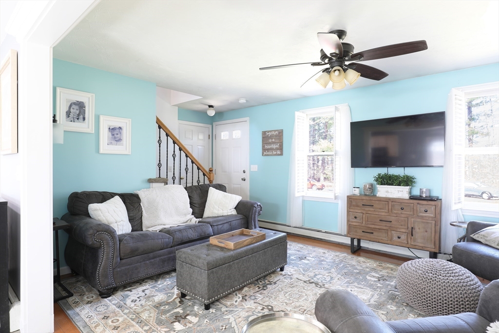 40 Pine Street Carver, MA 02330 - Photo 8 of 30 a living room with furniture and a flat screen tv