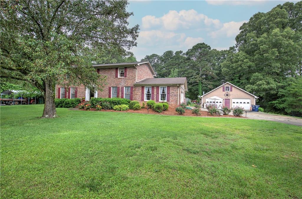 3637 Nebo Road Hiram, GA 30141 - Photo 4 of 63 a front view of house with yard and green space