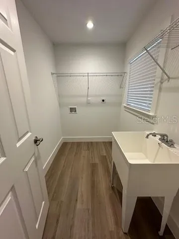 a bathroom with a sink and a bathtub