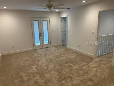 a view of a room with racks on the wall